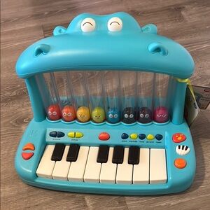 Blue and White Learning Musical Toy with Piano Keys and Xylophone Tubes